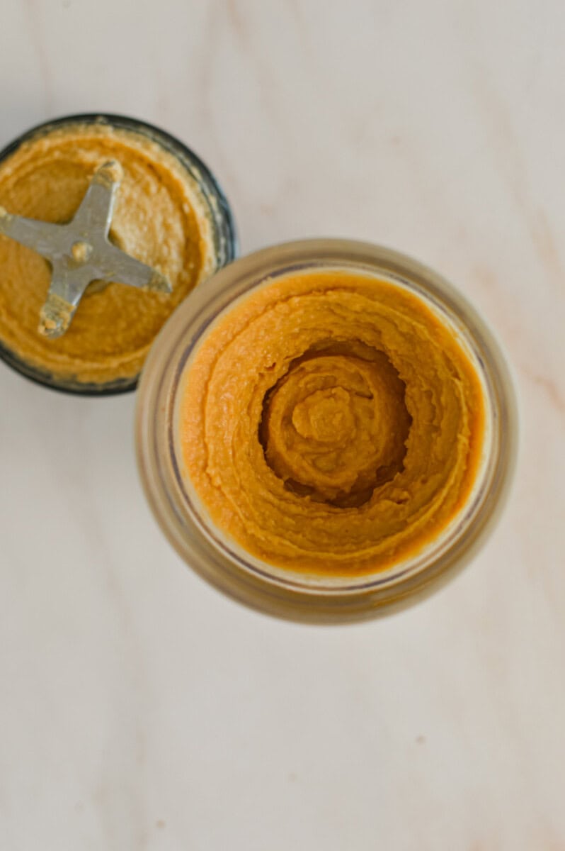 Hummus completely blended in a blender.