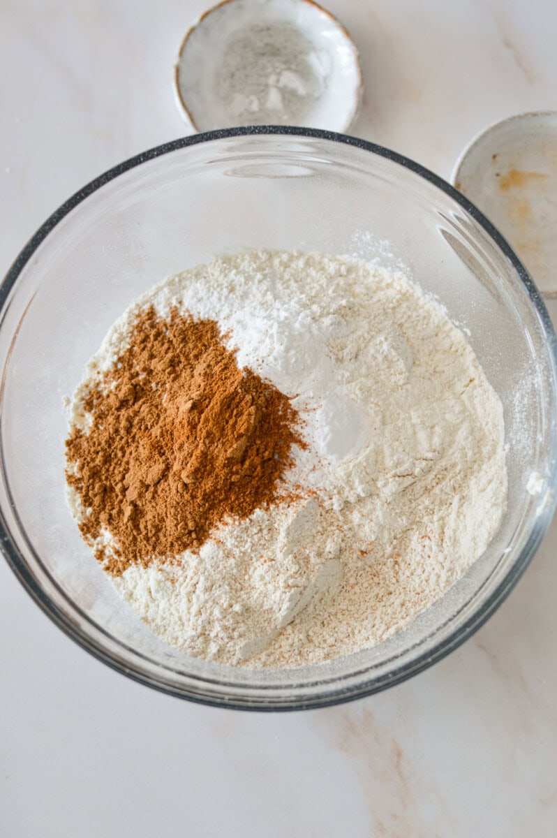 Dry ingredients added to a mixing bowl.