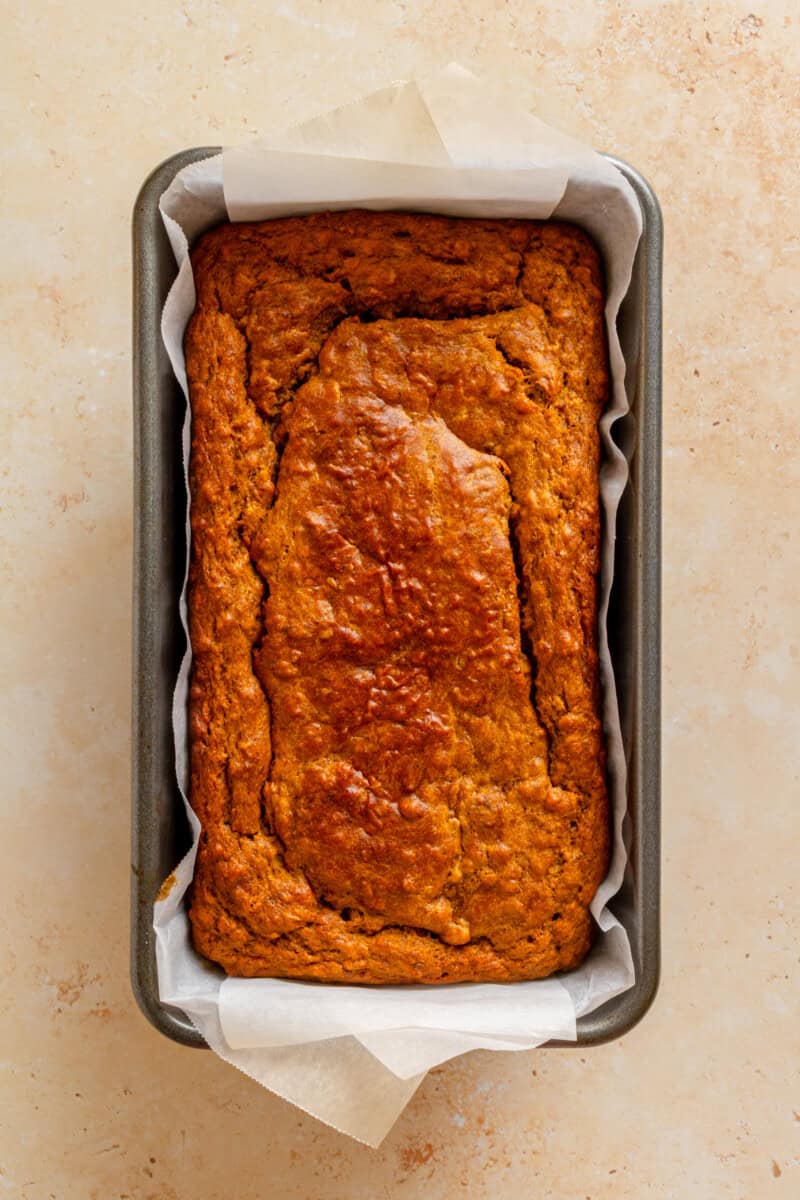 Chai banana bread baked in a loaf pan.